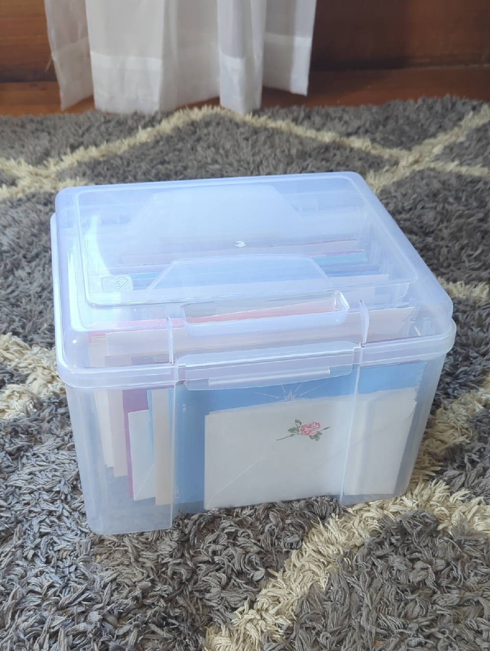 Clear Plastic Storage Box with Lid And Random Assortment Of Greeting Cards
